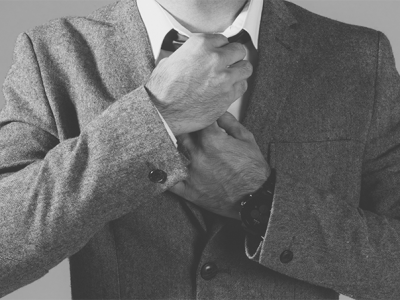 MCT_CourseImage_man_straightening_tie MCT_CourseImage_man_straightening_tie